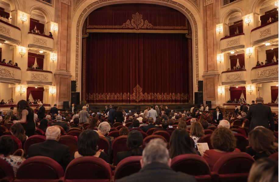 Audience inside a Yerevan theatre before an evening performance
